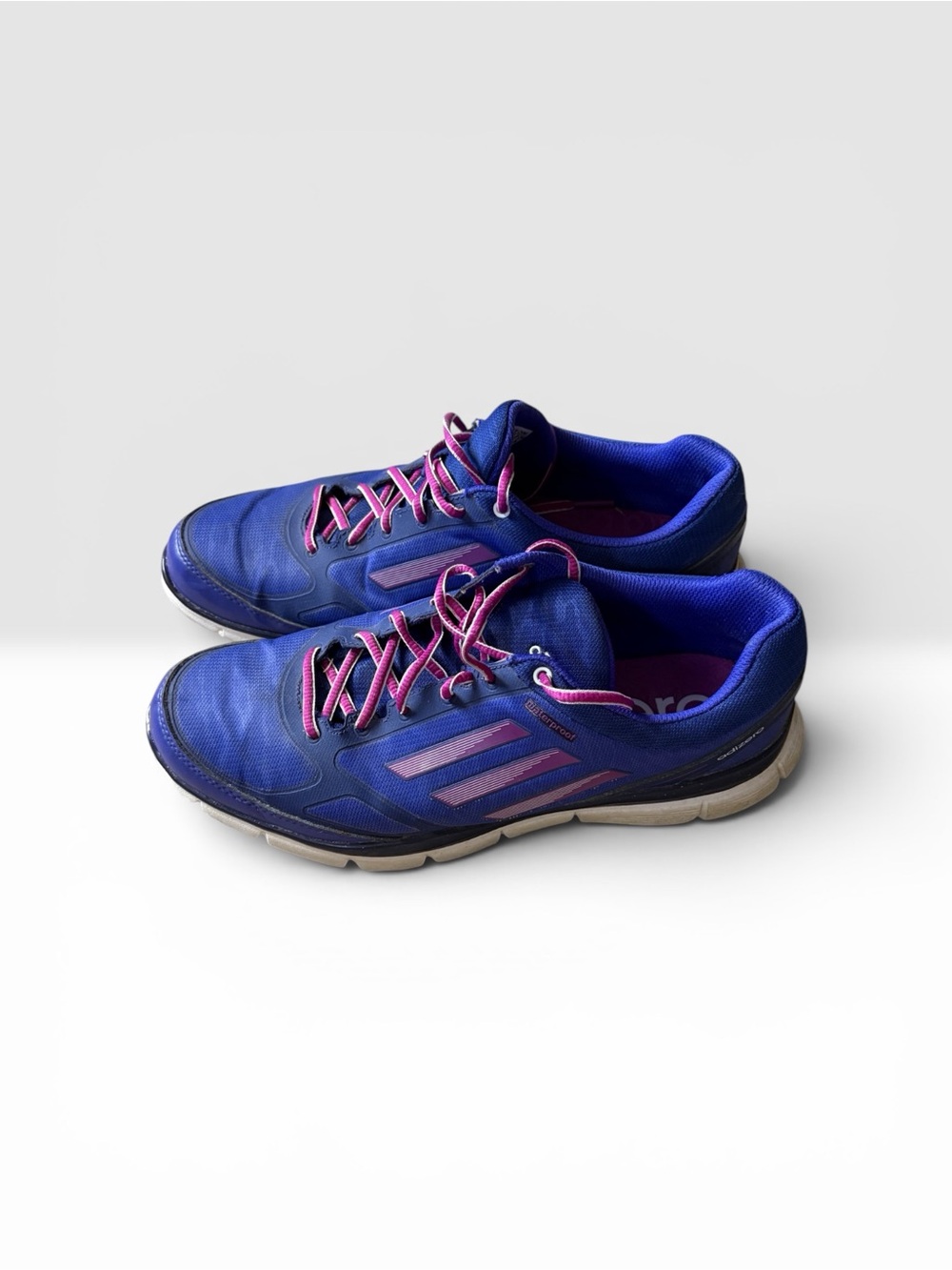 adidas Women's Blue Athletic Shoes with Pink Accents